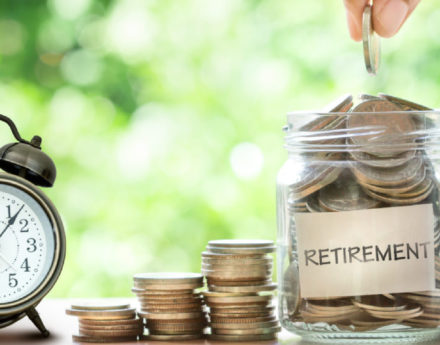 Coins in a jar labelled retirement