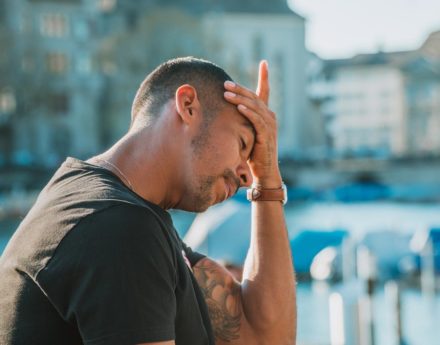 Man holding his head