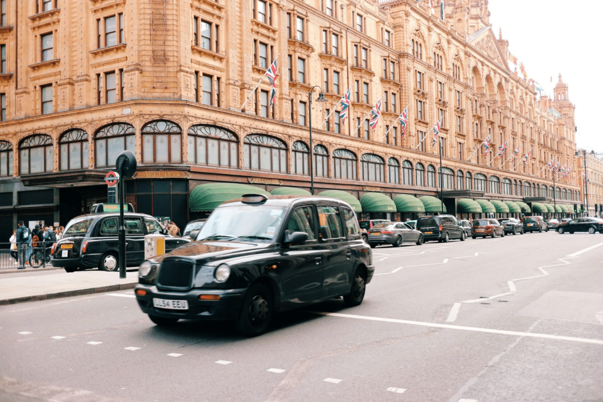 London taxi driving down Mayfair street | sell your house fast in London