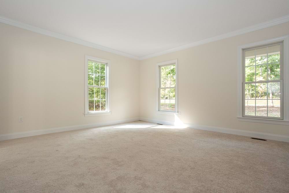 photo of empty room with carpet